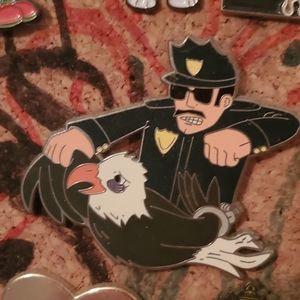 Cop vs eagle pin